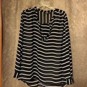 Sheer black and white blouse.